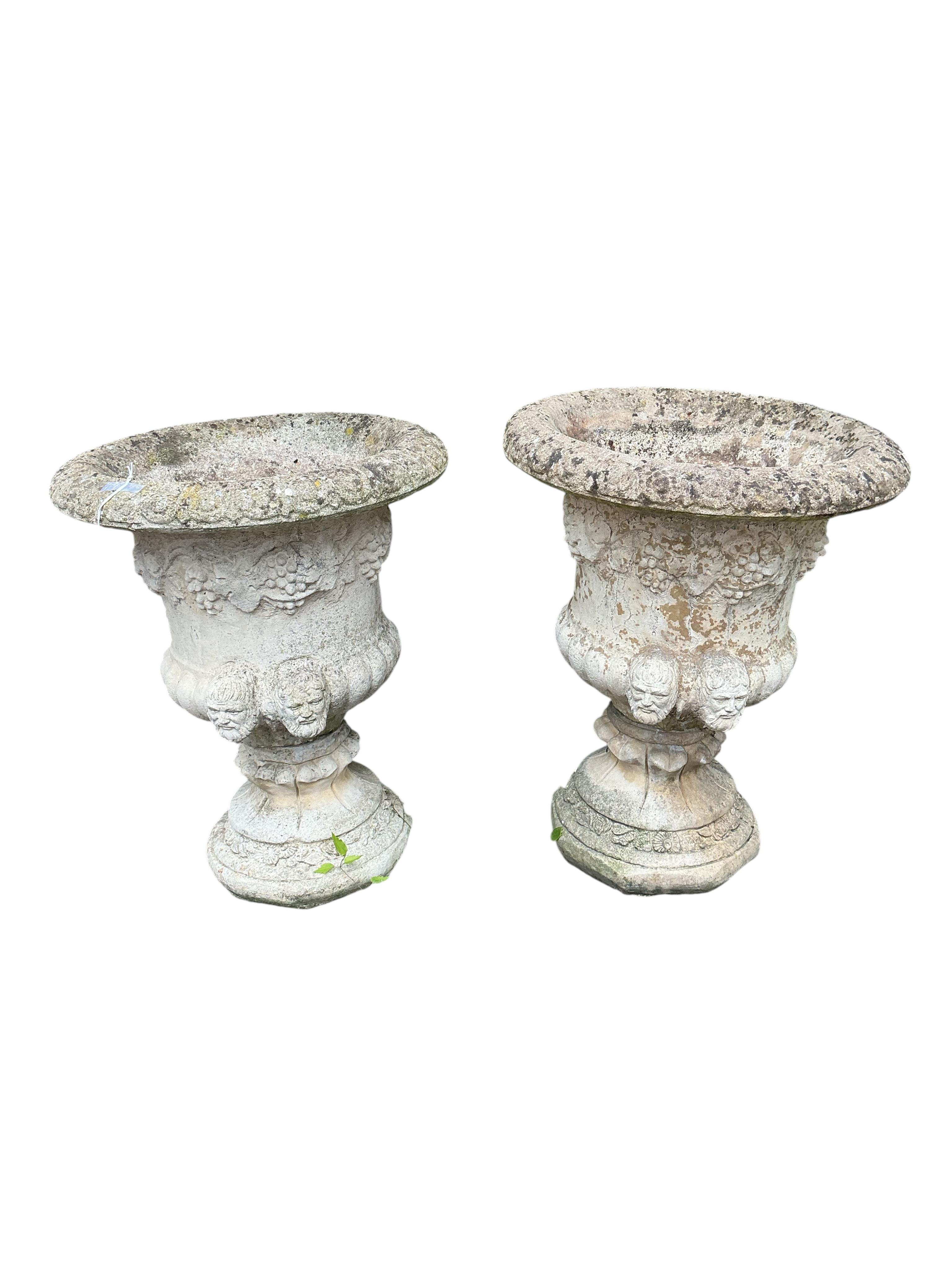A pair of reconstituted stone campana garden urns, diameter 55cm, height 66cm